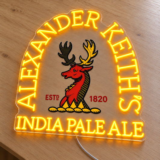 Alexander Keith’s LED neon sign on a light wooden surface, second angled view