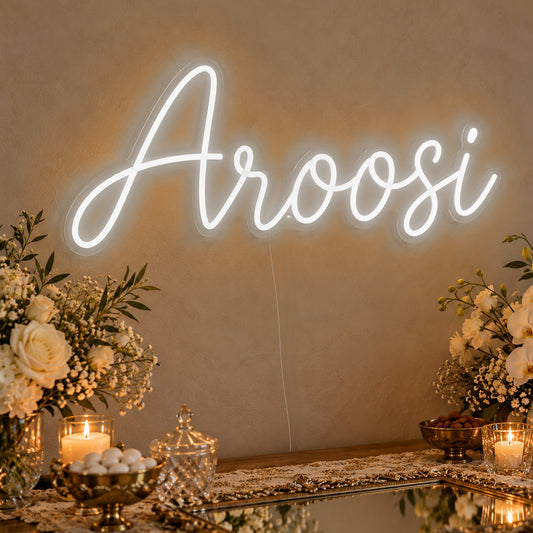 Aroosi Neon Sign in white LED neon on clear acrylic, angled view