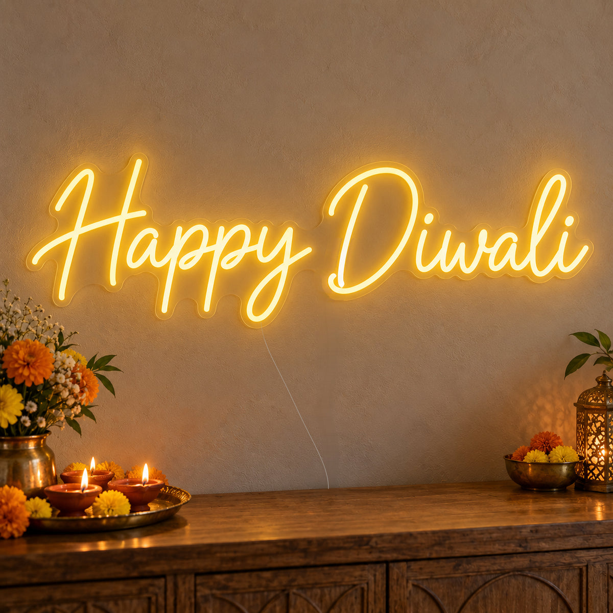 Happy Diwali Neon Sign on clear cut-to-shape acrylic, illuminated on a wall in a styled celebration setting