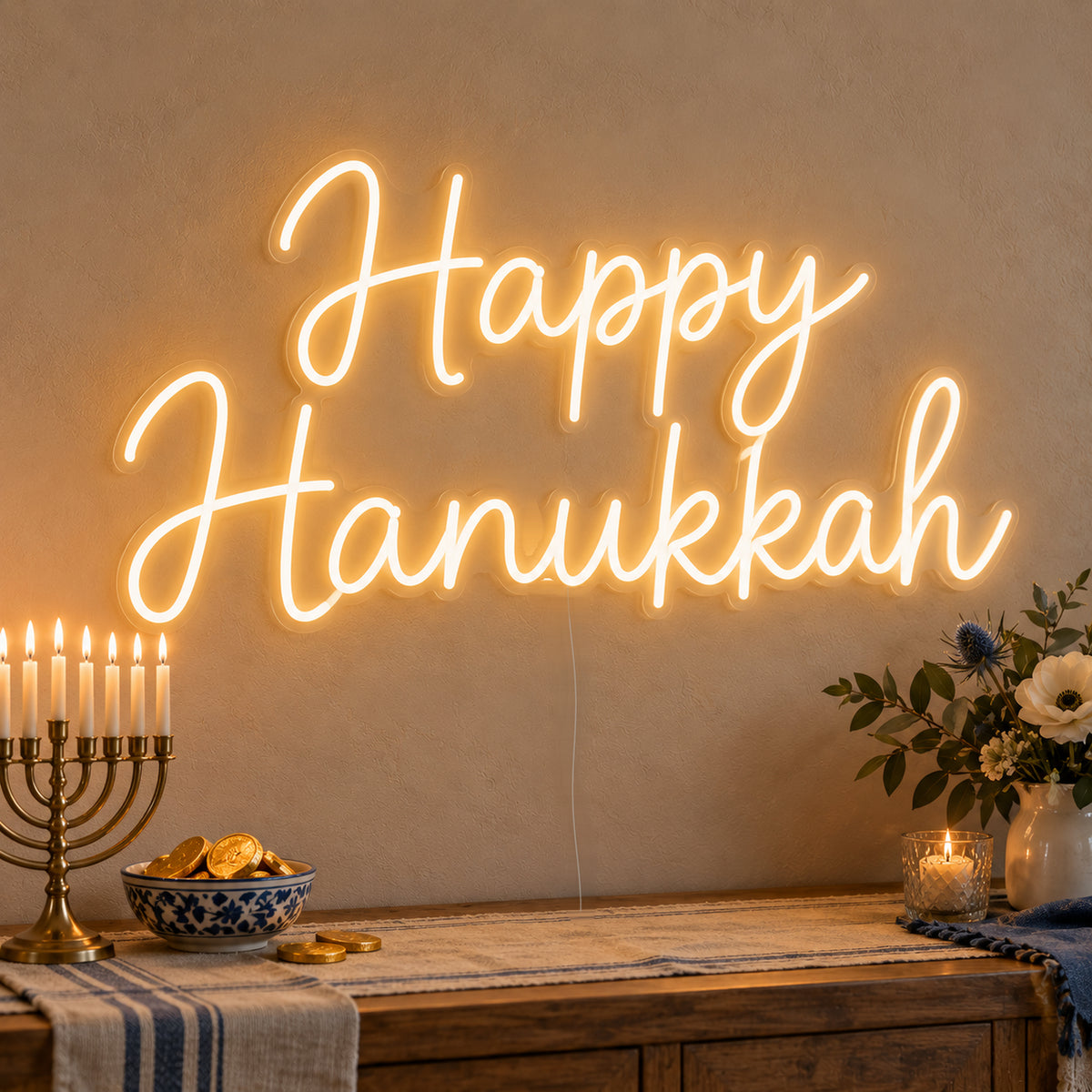 Happy Hanukkah Neon Sign on clear cut-to-shape acrylic, illuminated on a wall in a styled celebration setting