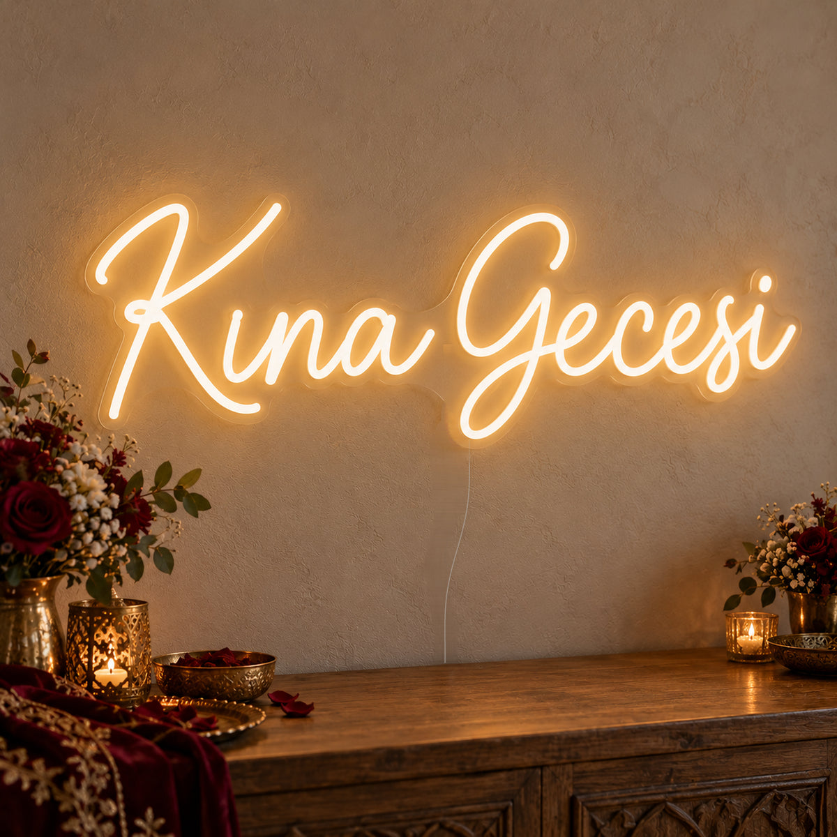 Kına Gecesi Neon Sign on clear cut-to-shape acrylic, illuminated on a wall in a styled celebration setting