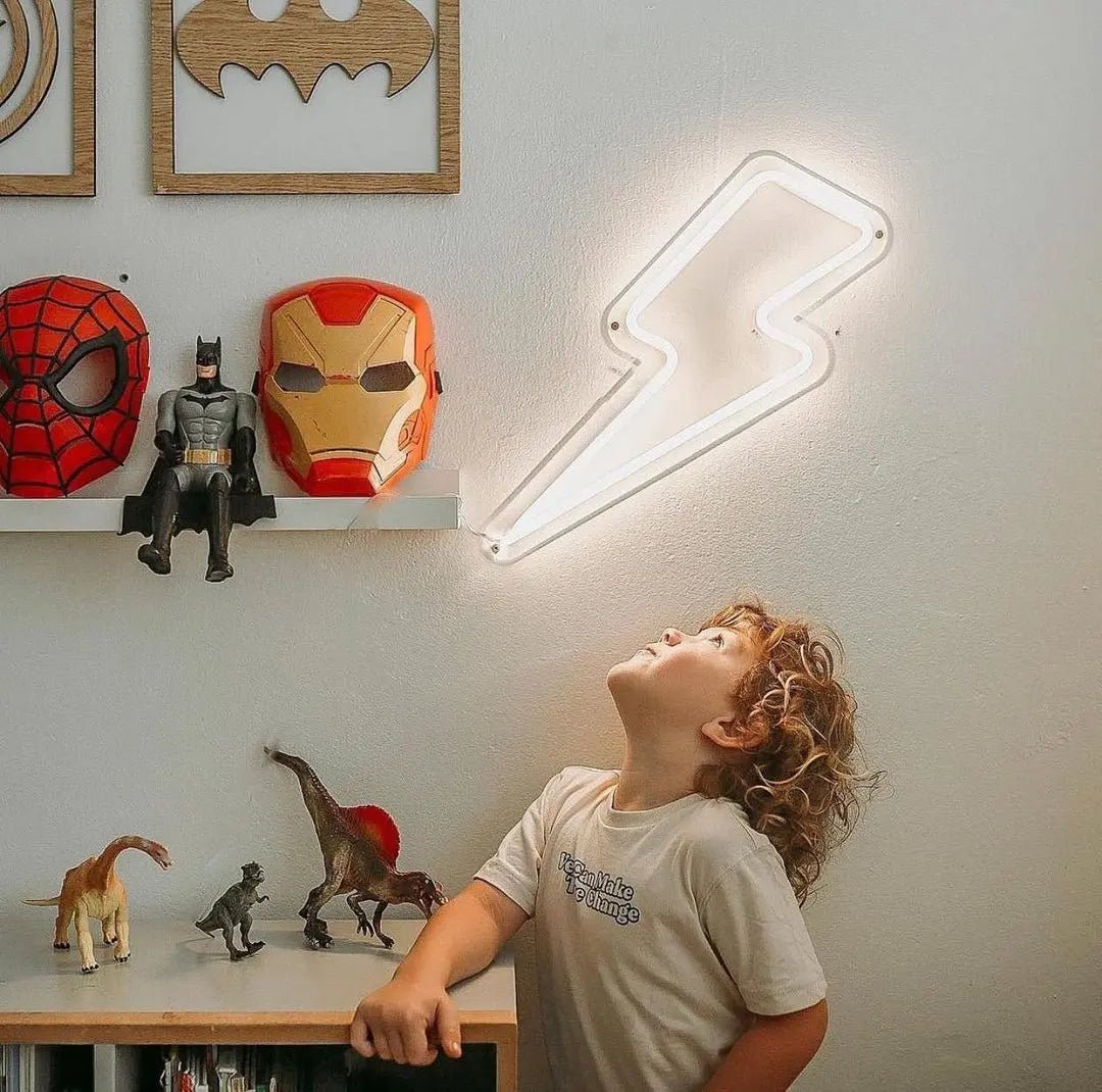 Lightning bolt LED Neon Light Sign in white, featuring lightning-bolt outline on a bedroom wall above a child.