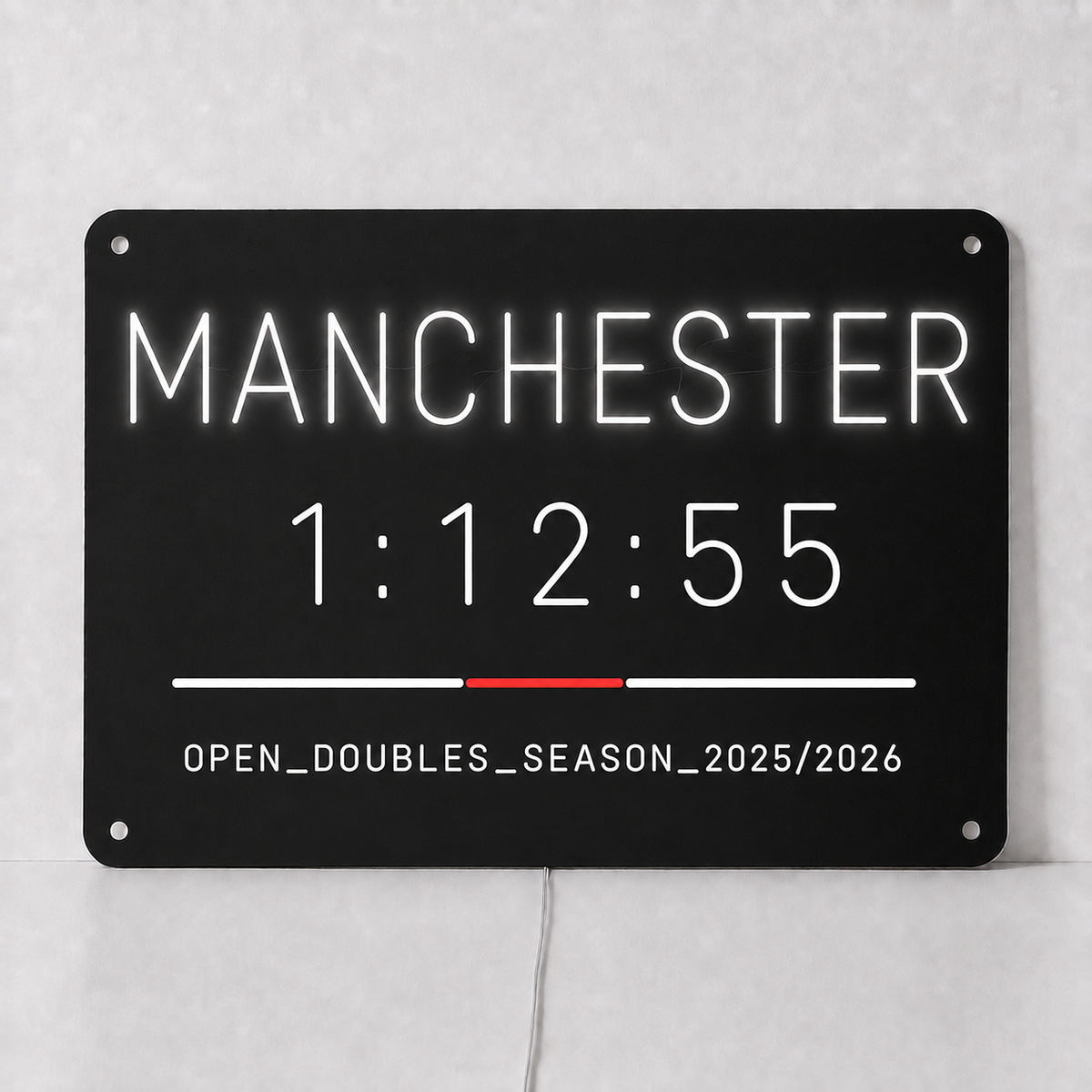 Custom hybrid race finish time LED neon sign shown with Manchester, a personalised finish time and a division and season line in white neon on black acrylic