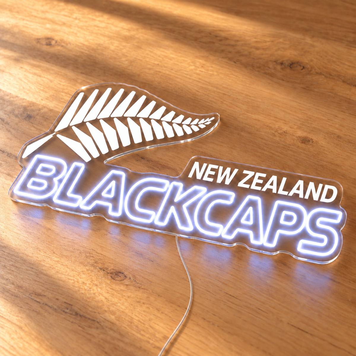 New Zealand Blackcaps LED neon sign on a wooden surface