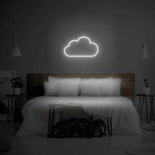 Cloud LED Neon Light Sign in white, featuring cloud outline illuminated above a bed.