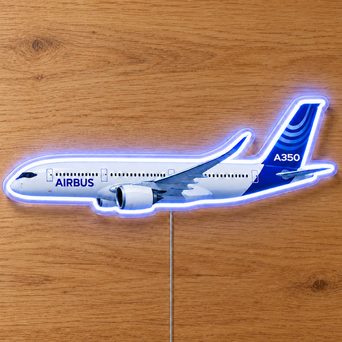 Airbus A350 Neon Sign with printed aircraft details and an illuminated LED outline on clear acrylic, shown on a wooden surface