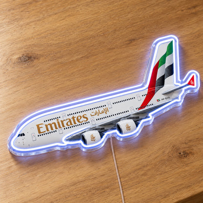 Airbus A380 Emirates Neon Sign with printed aircraft details and an illuminated LED outline on clear acrylic, shown on a wooden surface, registration A6-EOG