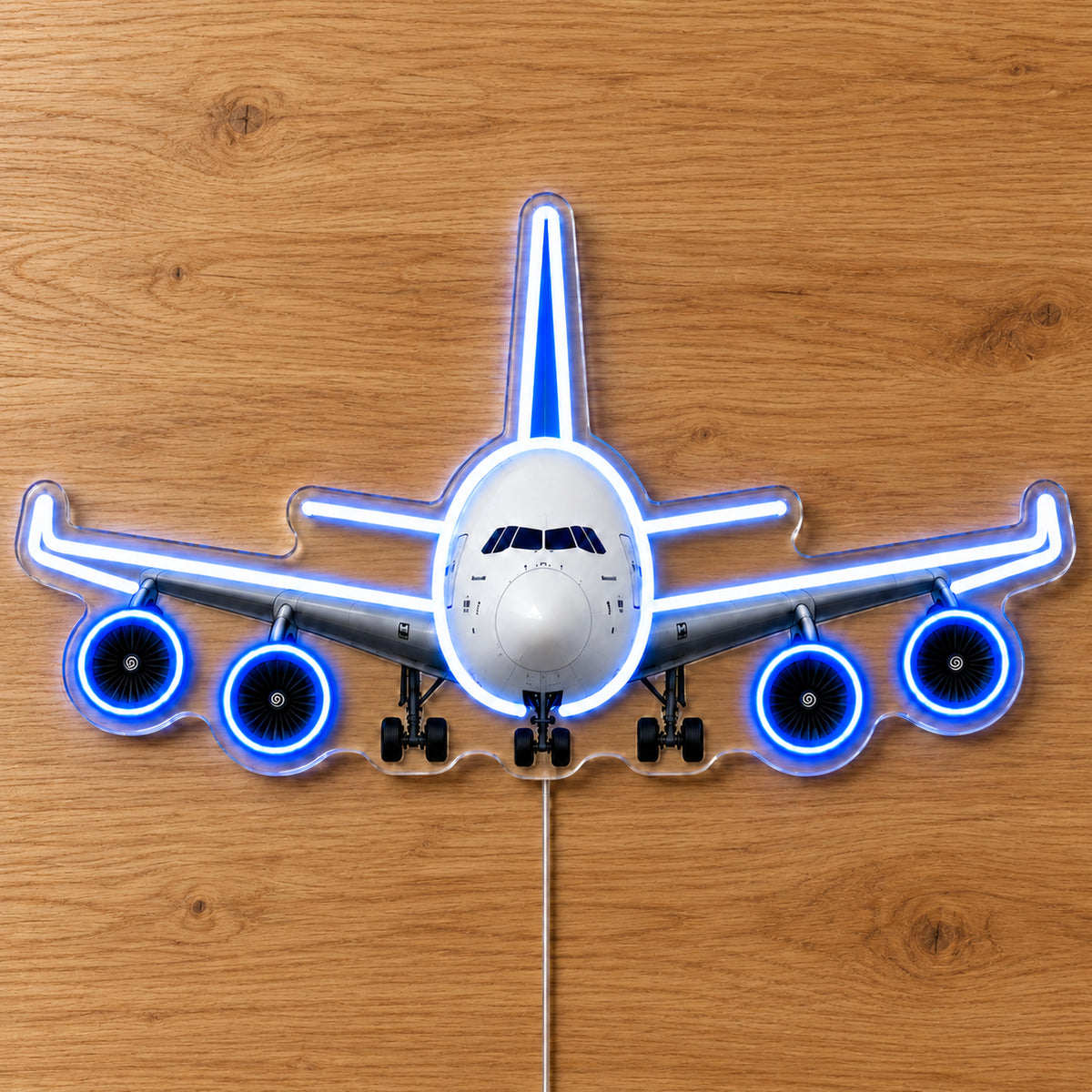Airbus A380 Front View Neon Sign with printed aircraft details and an illuminated LED outline on clear acrylic, shown on a wooden surface