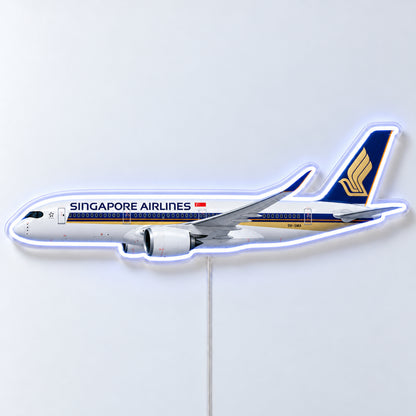 Airbus A350-900 Singapore Airlines Neon Sign with printed aircraft details and an illuminated LED outline on clear acrylic, shown from the front on a white surface, registration 9V-SMA