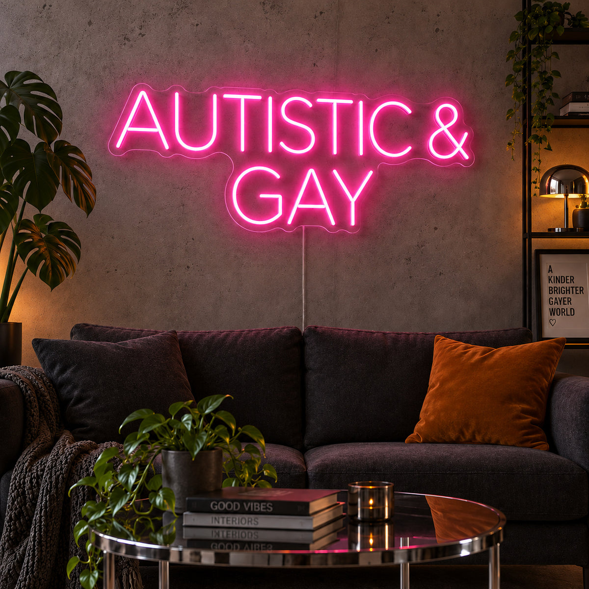 Autistic & Gay Neon Sign glowing pink above a dark sofa against a concrete wall.