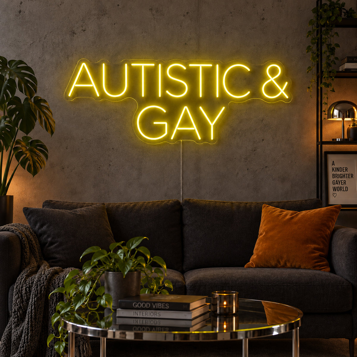 Autistic & Gay Neon Sign with yellow lighting, displayed above a dark sofa against a concrete wall.
