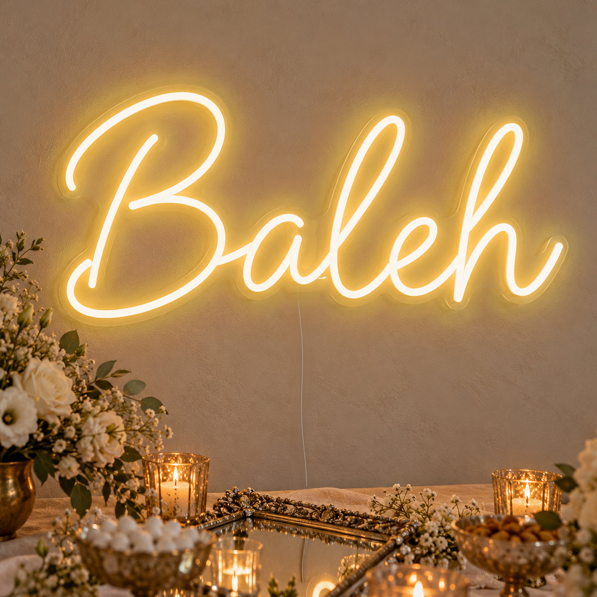 Baleh Neon Sign in gold LED neon on clear acrylic, angled view