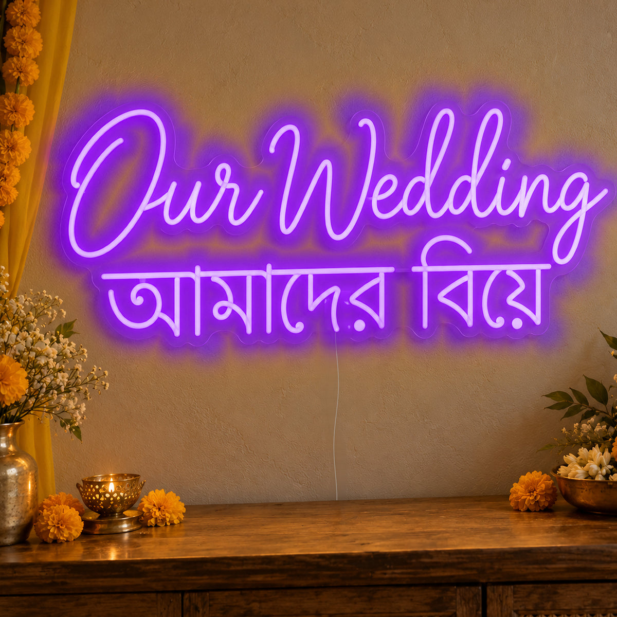 Our Wedding English & Bengali Neon Sign in purple LED neon on clear acrylic, angled view