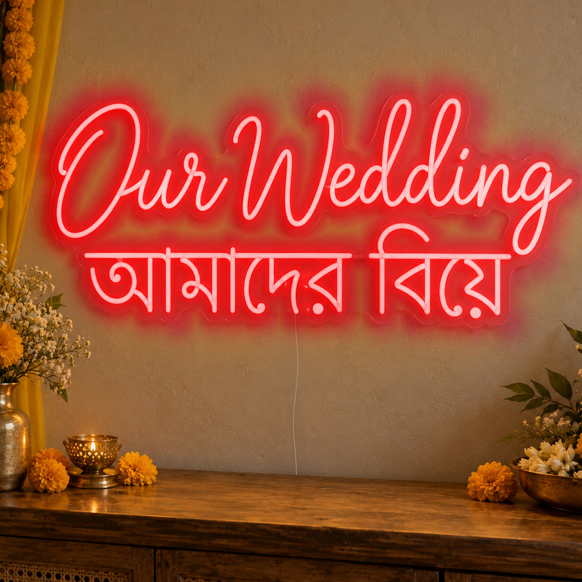 Our Wedding English & Bengali Neon Sign in red LED neon on clear acrylic, angled view