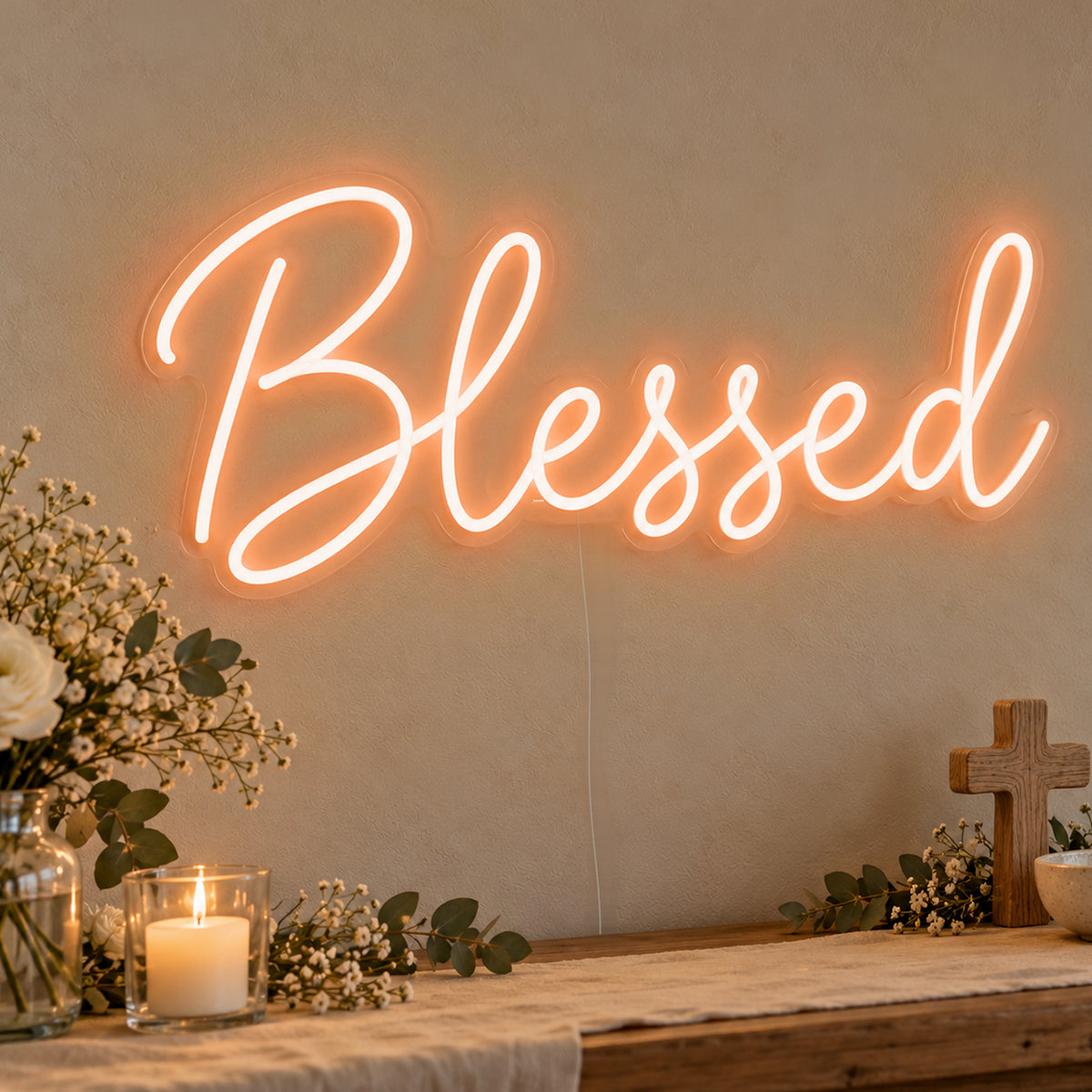 Blessed Neon Sign in orange LED neon on clear acrylic, angled view