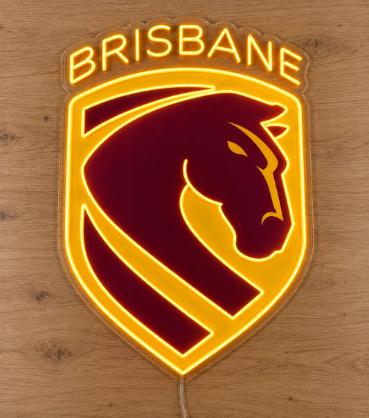 Brisbane Broncos Neon Sign on light wooden surface