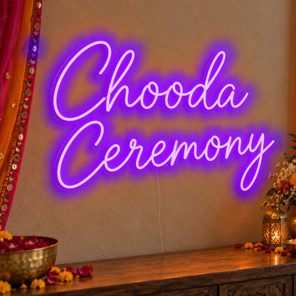 Chooda Ceremony Neon Sign in purple LED neon on clear acrylic, angled view