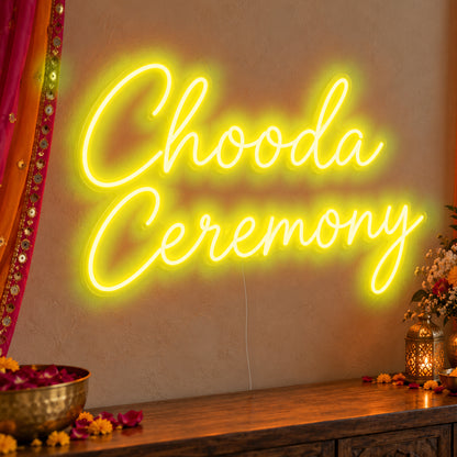 Chooda Ceremony Neon Sign in yellow LED neon on clear acrylic, angled view
