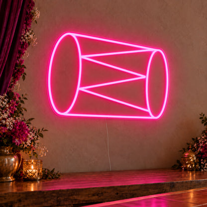 Dhol Drum Neon Sign on clear cut-to-shape acrylic, illuminated on a wall in a styled celebration setting
