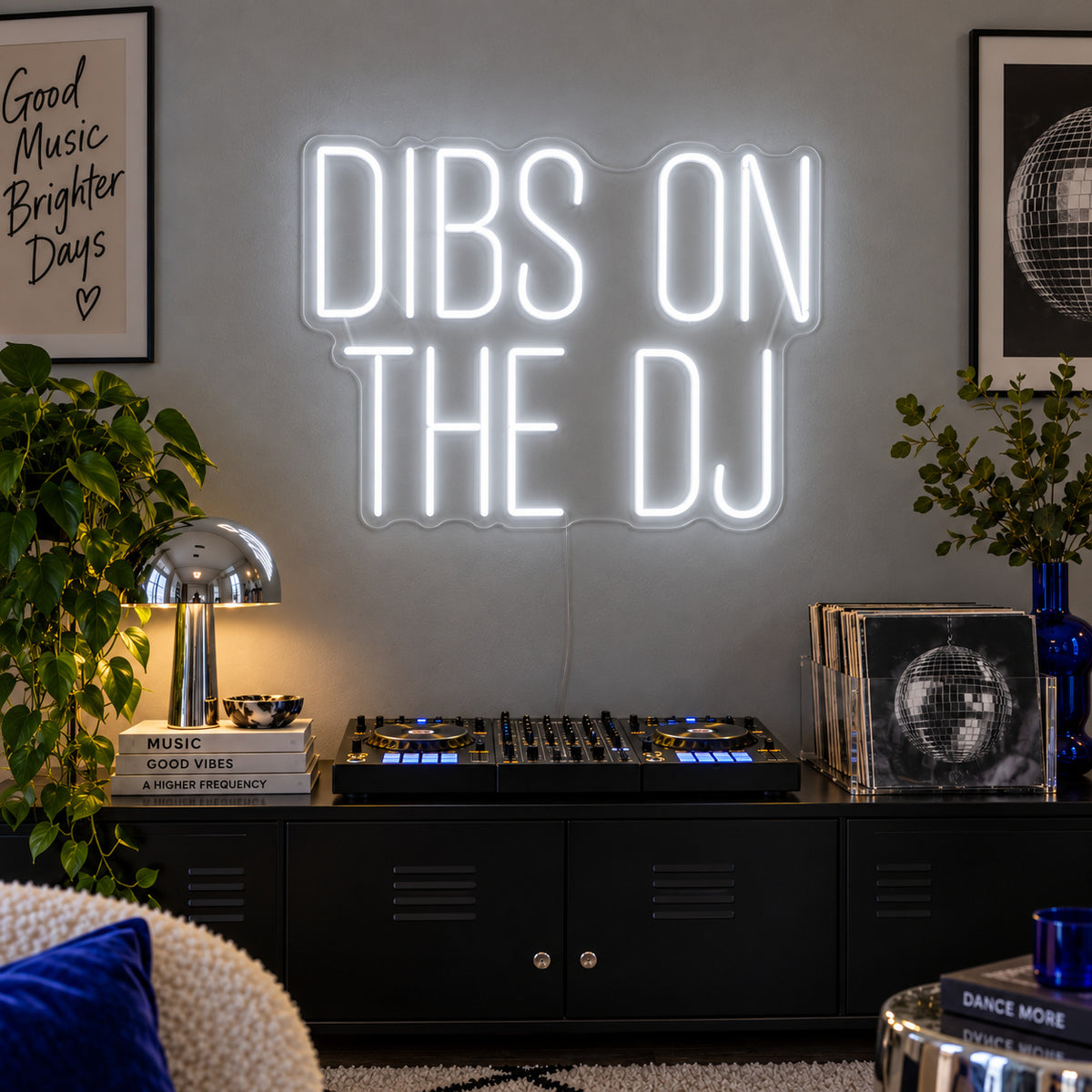 Dibs On The DJ Neon Sign, RGB colour-changing option shown in white above a home DJ setup.