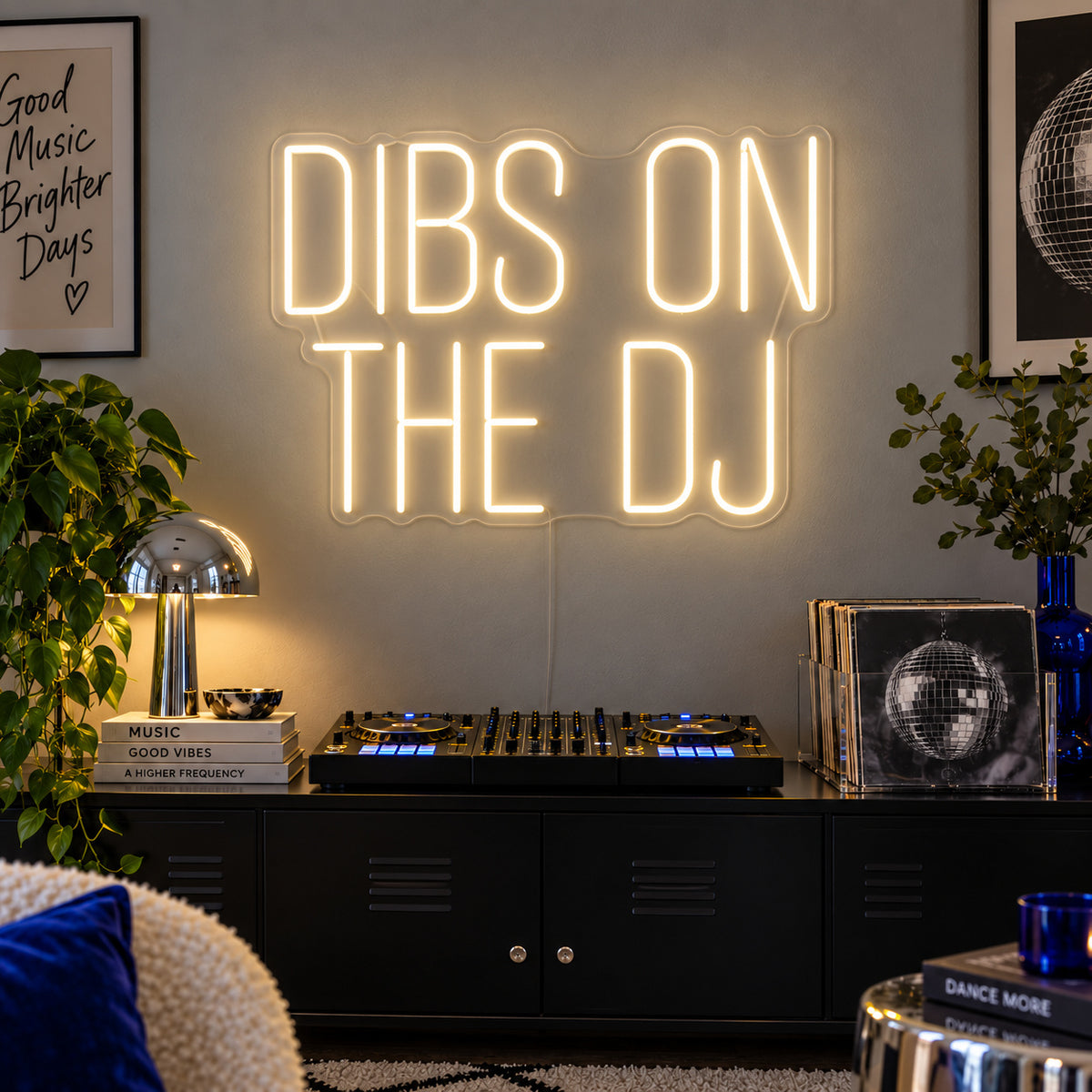 Warm White version of the Dibs On The DJ Neon Sign, shown above a home DJ setup.