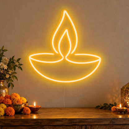 Diya Lamp Neon Sign in gold LED neon on clear acrylic, angled view