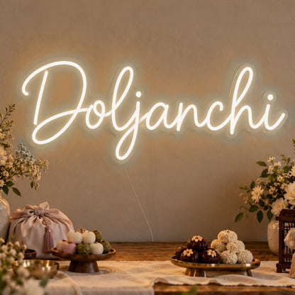 Doljanchi Neon Sign in warm white LED neon on clear acrylic, angled view