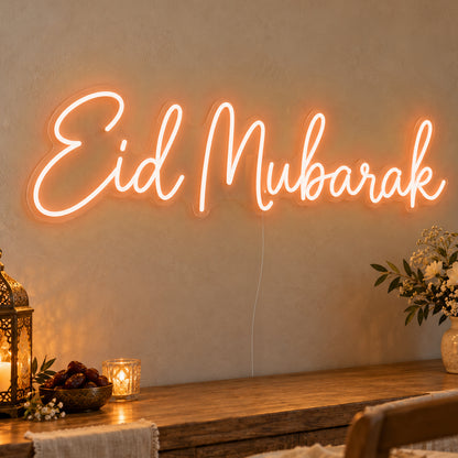 Eid Mubarak Neon Sign in orange LED neon on clear acrylic, angled view