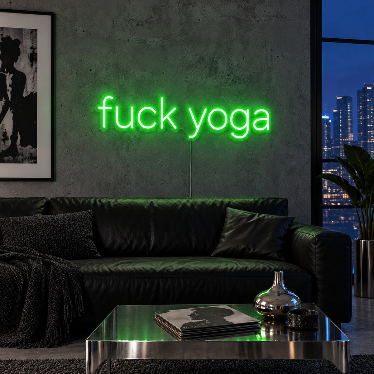 Fuck Yoga Neon Sign with green lighting, displayed above a black leather sofa.