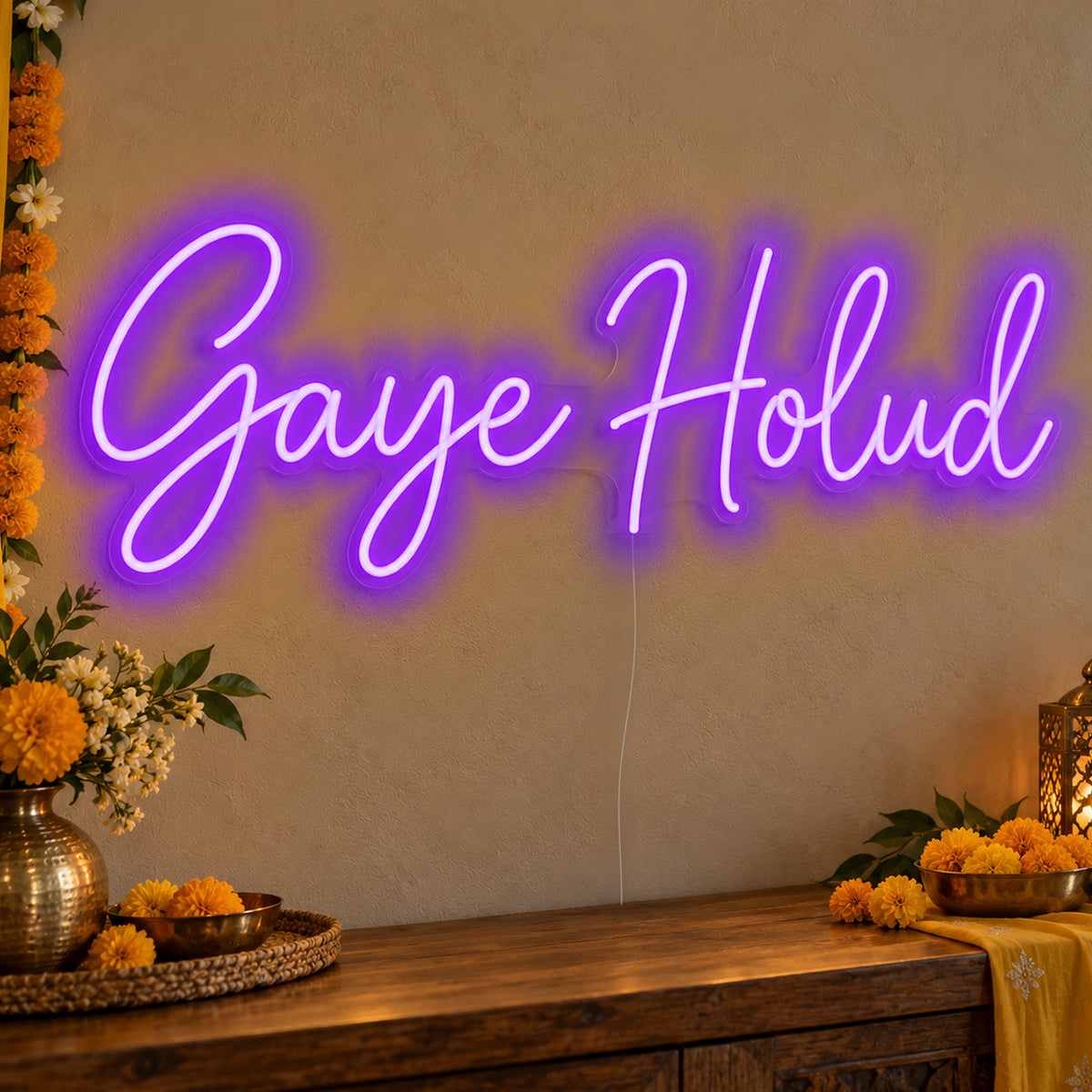 Gaye Holud Neon Sign in purple LED neon on clear acrylic, angled view