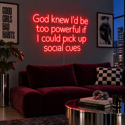 God Knew I'd Be Too Powerful If I Could Pick Up Social Cues Neon Sign with red lighting, displayed above a burgundy sofa.