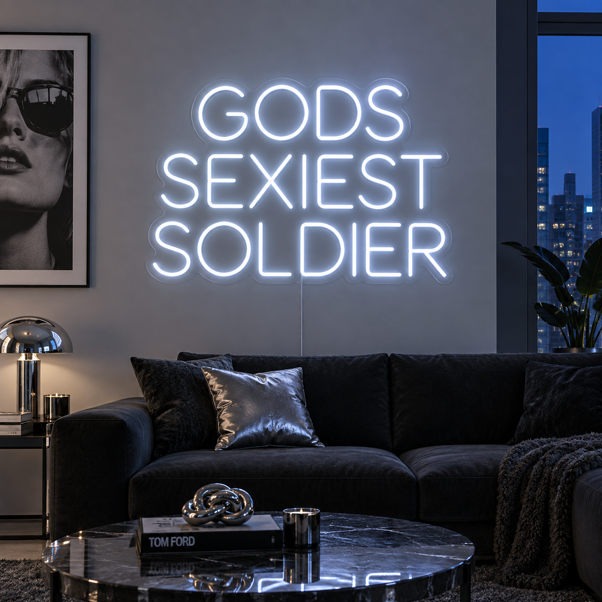 Gods Sexiest Soldier Neon Sign in white in rounded lettering above a dark sofa.
