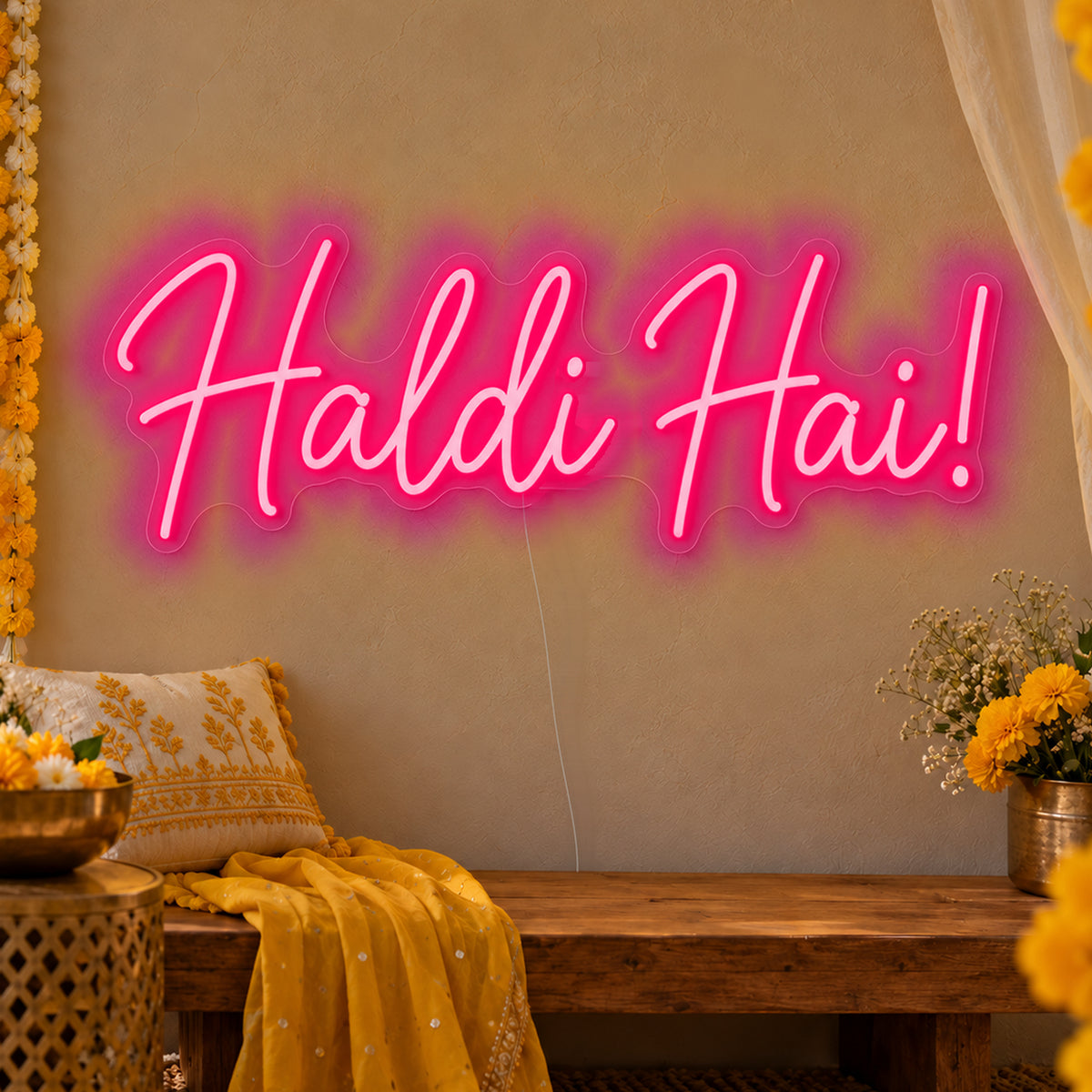Haldi Hai Neon Sign in rose red LED neon on clear acrylic, angled view