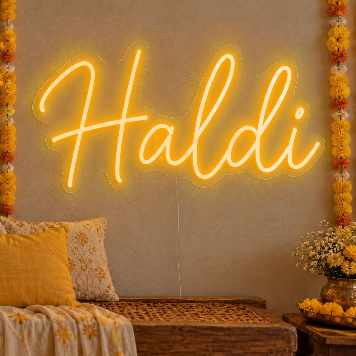 Haldi Neon Sign in gold LED neon on clear acrylic, angled view