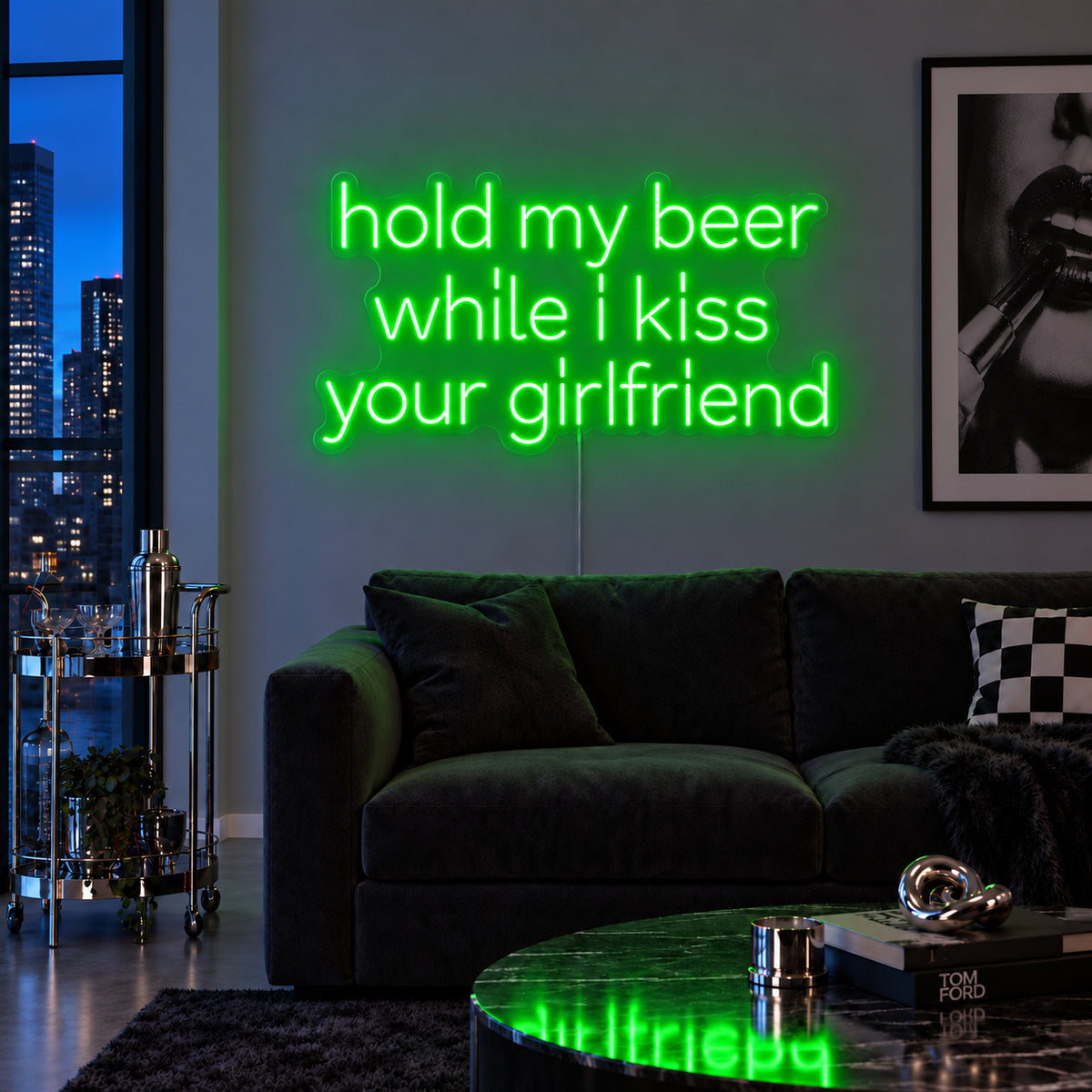 Hold My Beer While I Kiss Your Girlfriend Neon Sign with green lighting, displayed above a burgundy sofa.