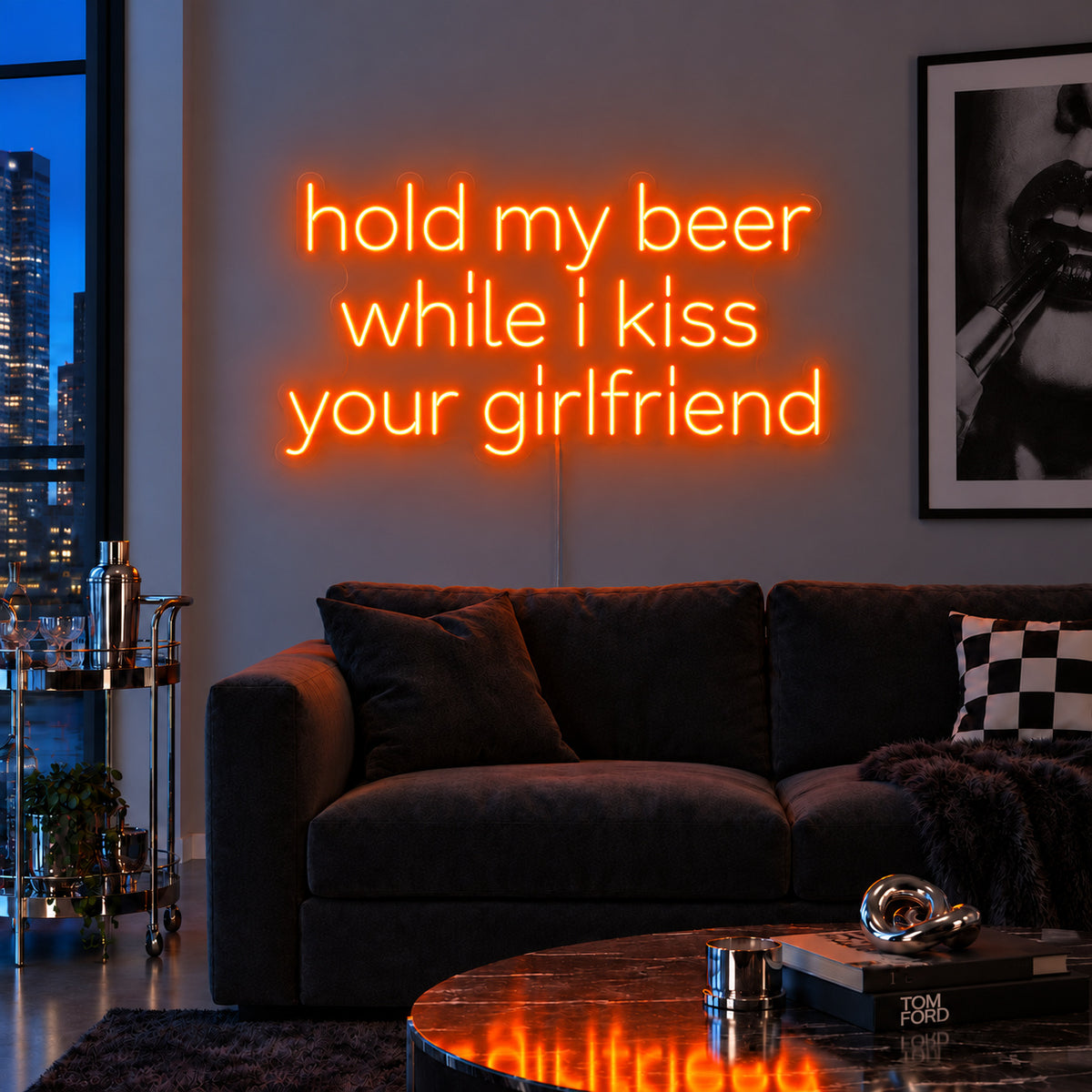 Orange version of the Hold My Beer While I Kiss Your Girlfriend Neon Sign, shown above a burgundy sofa.