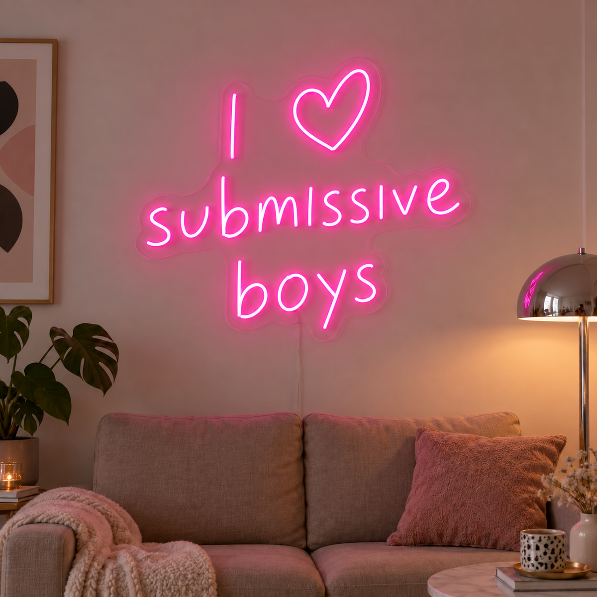 I Love Submissive Boys Neon Sign in pink above a neutral sofa.