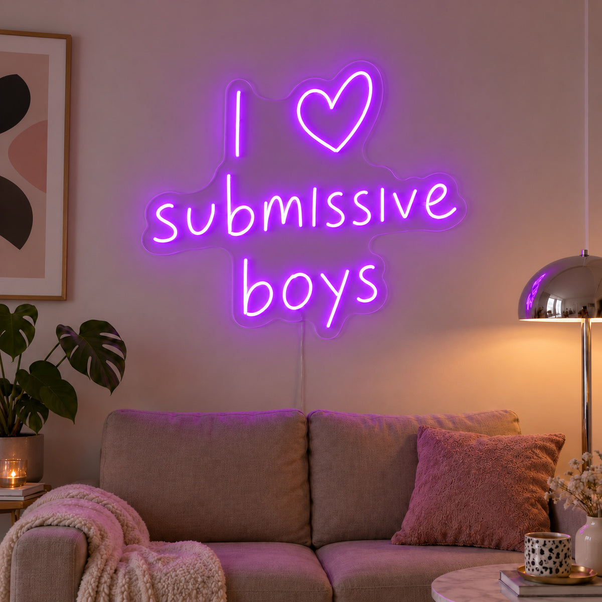 I Love Submissive Boys Neon Sign with purple lighting, displayed above a neutral sofa.
