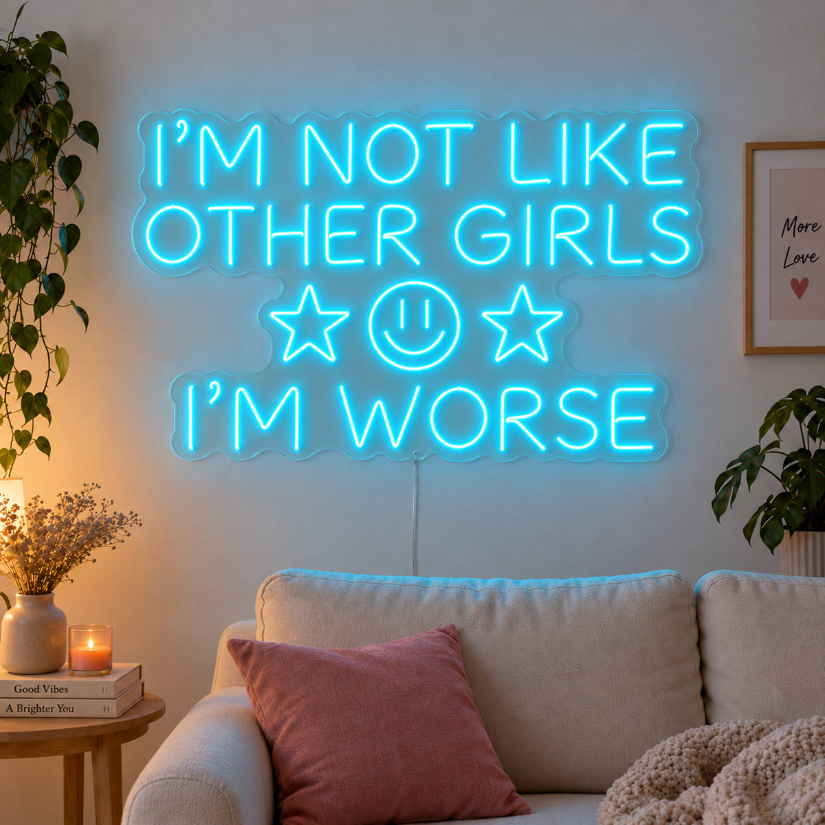 Ice Blue version of the I'm Not Like Other Girls I'm Worse Neon Sign, shown with stars and a smiley face above a cream sofa.