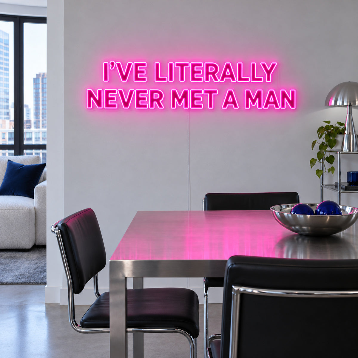 I've Literally Never Met A Man Neon Sign glowing pink above a dining table.