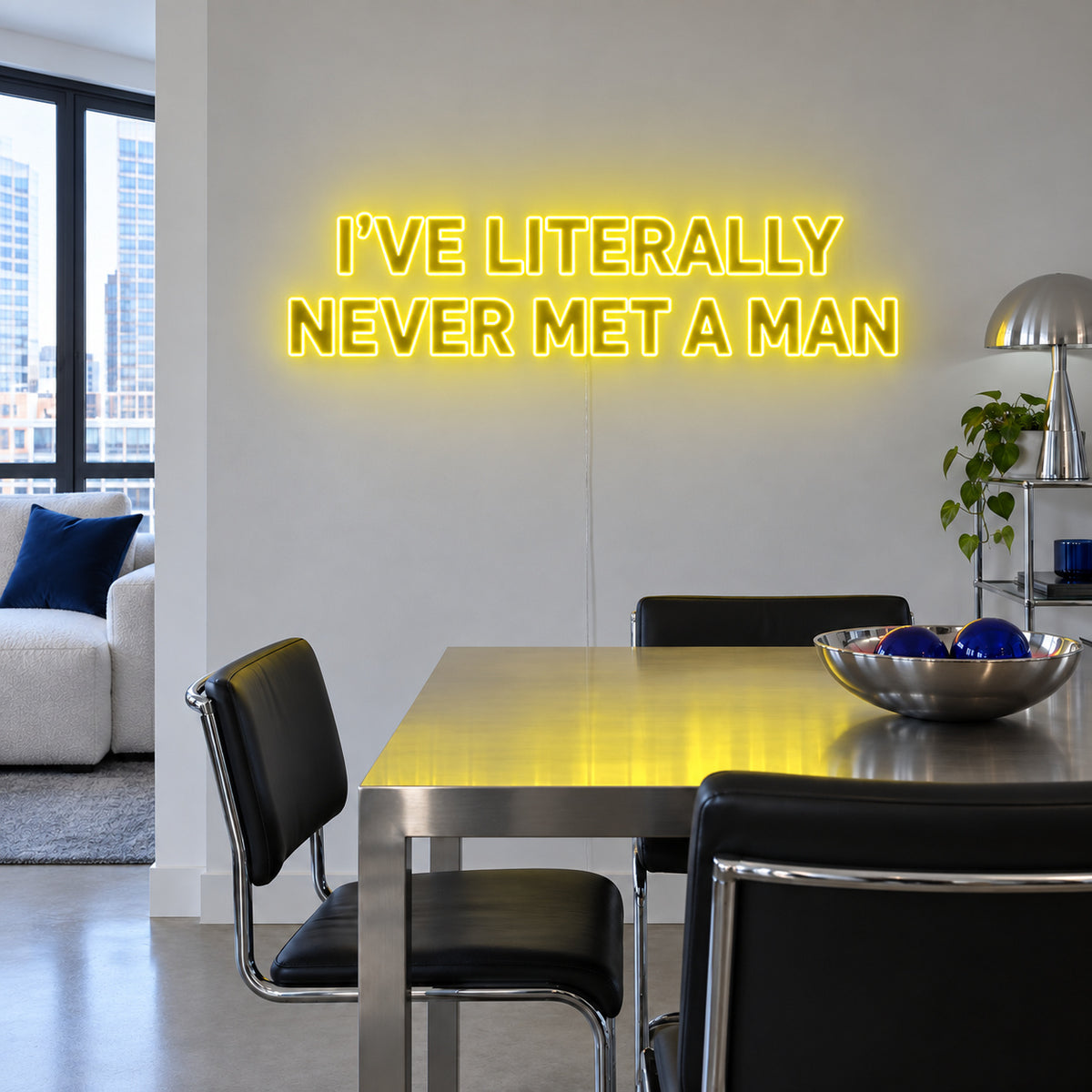 I've Literally Never Met A Man Neon Sign with yellow lighting, displayed above a dining table.