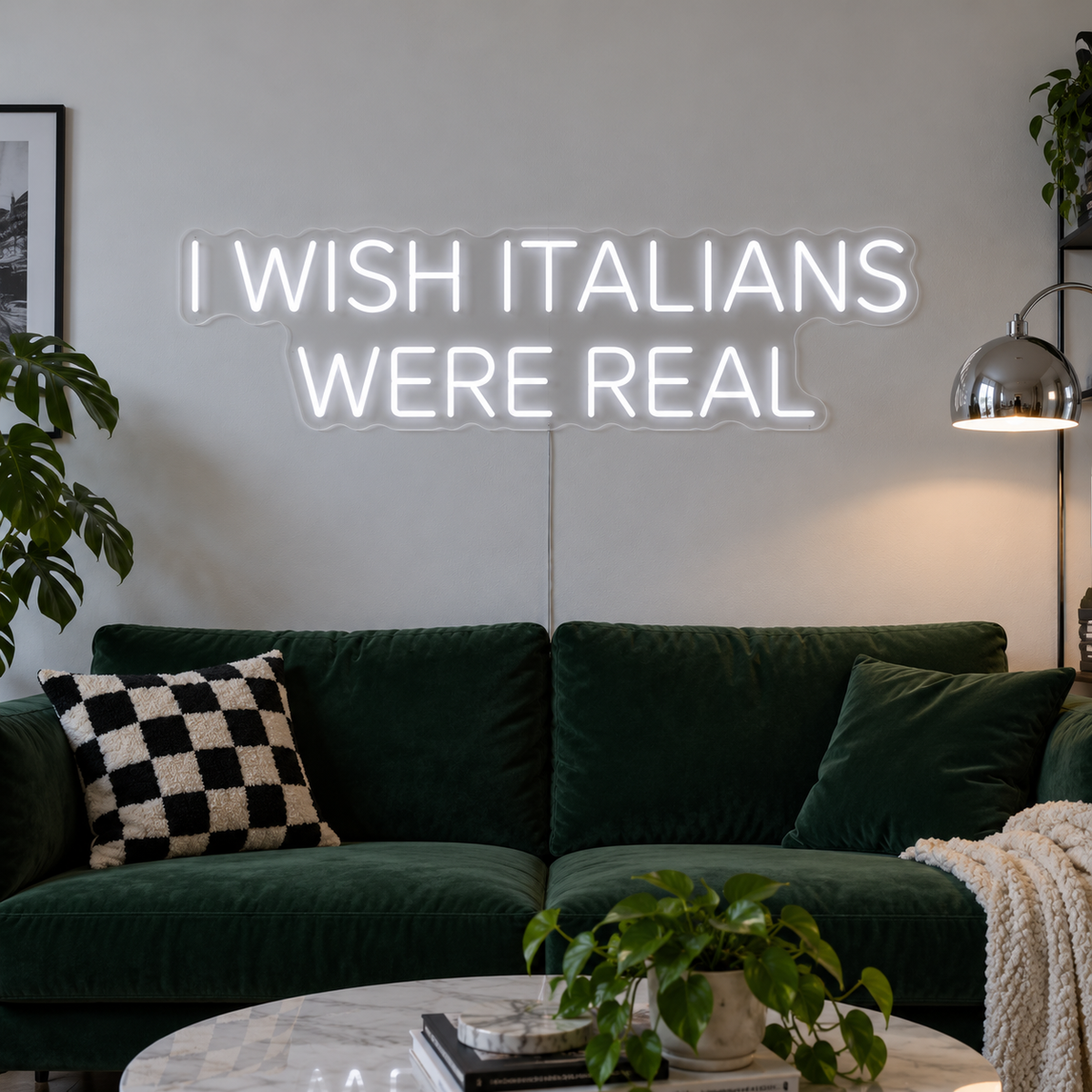 I Wish Italians Were Real Neon Sign, RGB colour-changing option shown in white above a green sofa.
