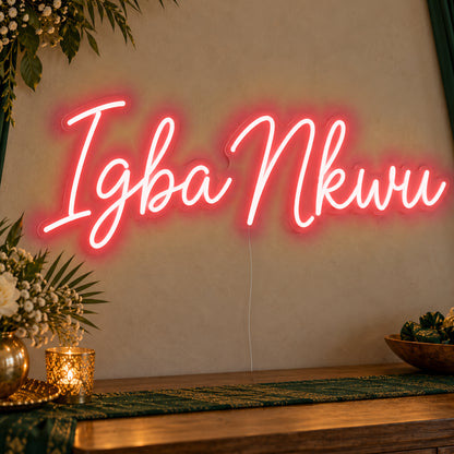 Igba Nkwu Neon Sign in red LED neon on clear acrylic, angled view