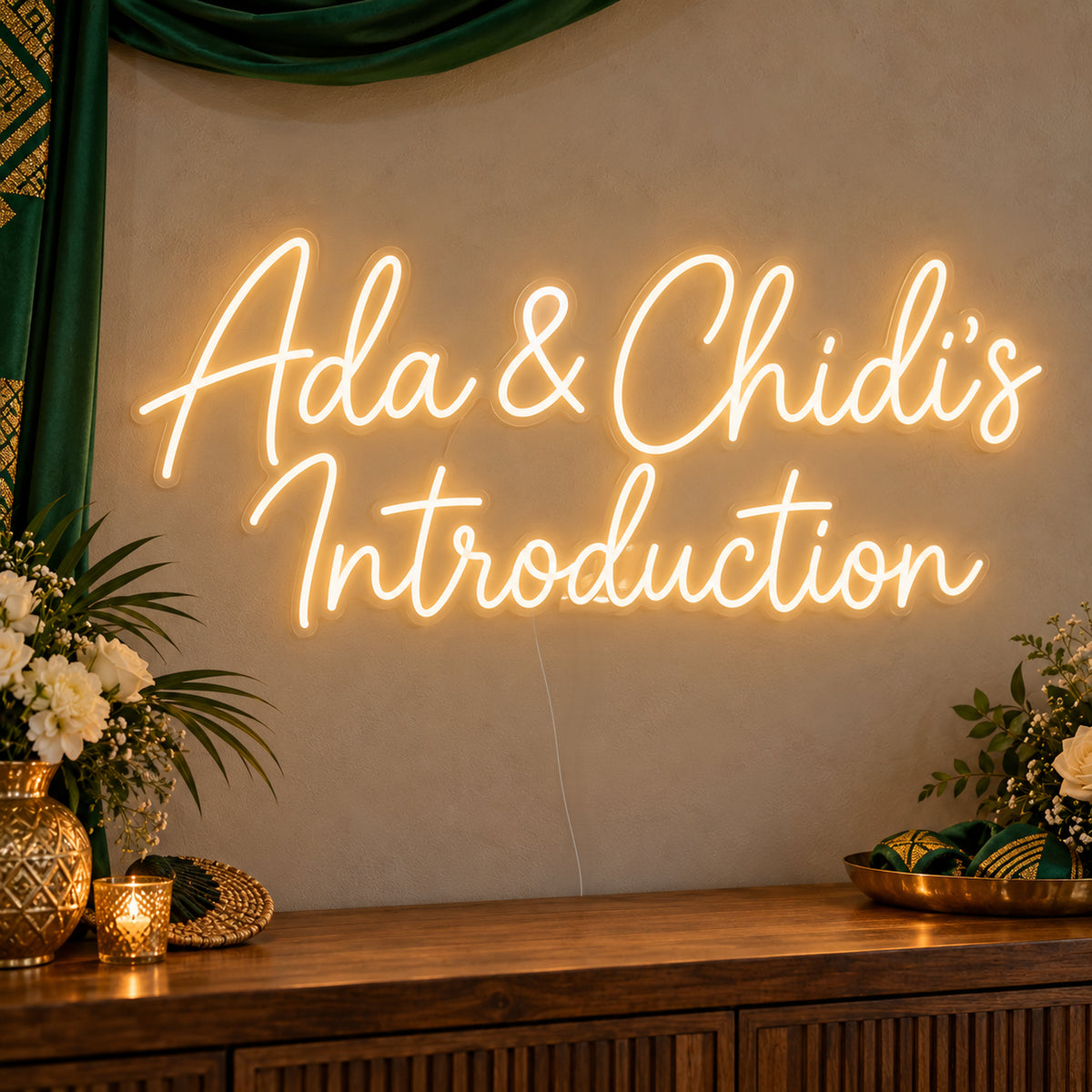 Personalised Introduction Neon Sign on clear cut-to-shape acrylic, illuminated on a wall in a styled celebration setting; sample personalised wording shown