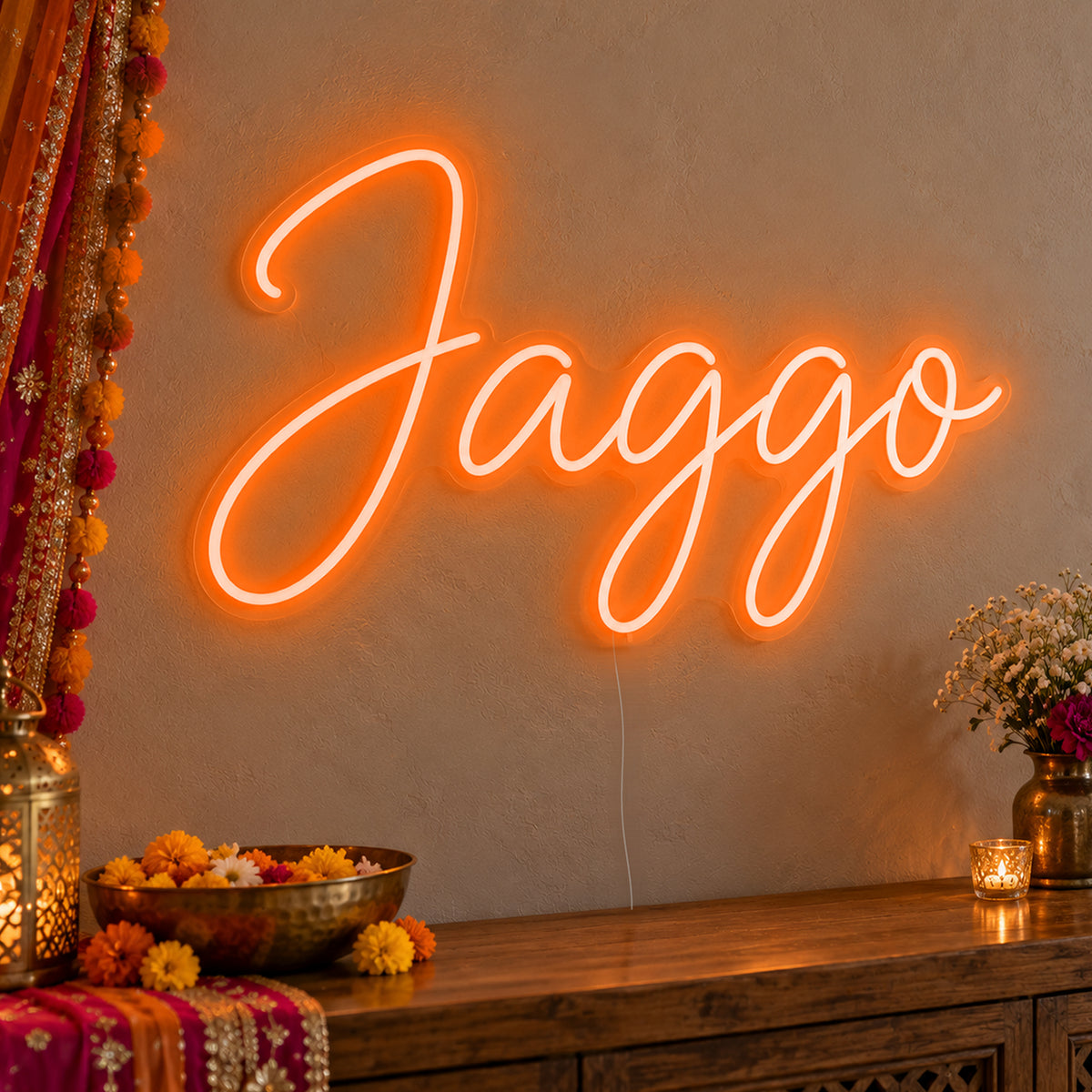 Jaggo Neon Sign in orange LED neon on clear acrylic, angled view