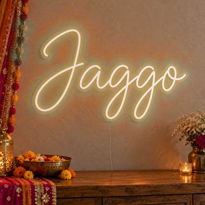 Jaggo Neon Sign in warm white LED neon on clear acrylic, angled view