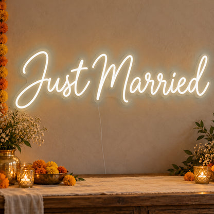 Just Married Neon Sign in warm white LED neon on clear acrylic, angled view