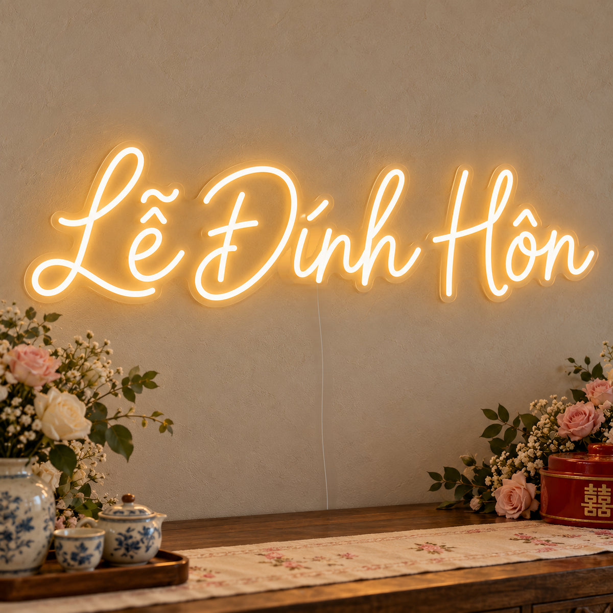Lễ Đính Hôn Neon Sign on clear cut-to-shape acrylic, illuminated on a wall in a styled celebration setting
