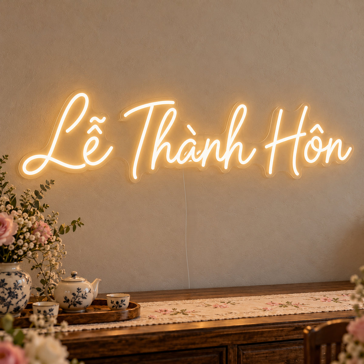 Lễ Thành Hôn Neon Sign on clear cut-to-shape acrylic, illuminated on a wall in a styled celebration setting