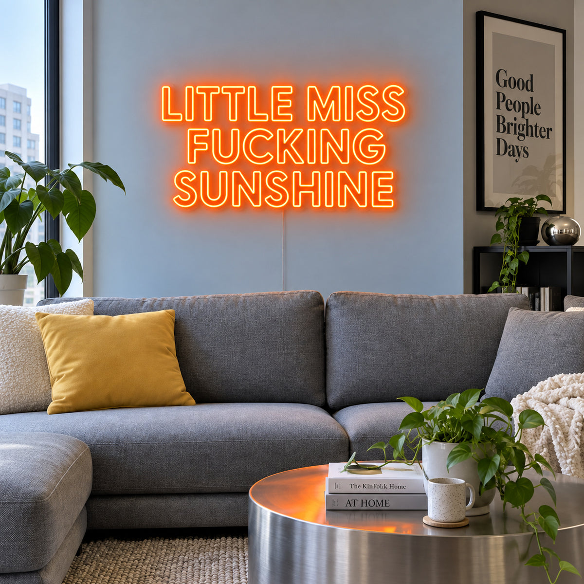 Orange version of the Little Miss Fucking Sunshine Neon Sign, shown above a grey sofa with yellow cushions.